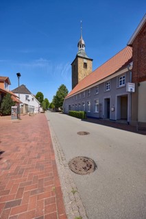 Streets, church tower of St. Johannis, historical buildings, pointed roof with red roof tiles,