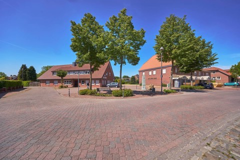 Street, bollards, trees, bench, 1000 year fountain, lantern, clinker brick pavement, concrete