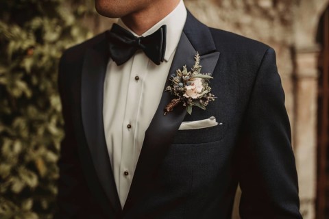 Handsome groom in elegant costume before the weeding waiting to join his bride, AI generated