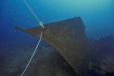 Calm shipwreck with a rope at the bow on the seabed. Dive site wreck Le Vapeur, Giens peninsula,