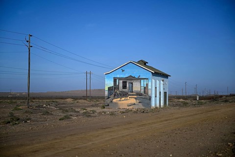 Painted house facade, graffito, brown hyena, diamonds, Oranjemund, Karas region, Namibia