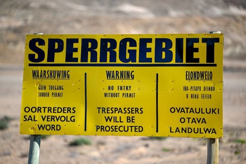 Restricted area sign, diamond restricted area, near Oranjemund, Karas region, Namibia