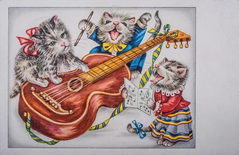 Old postcard and greeting card. Music-making cats