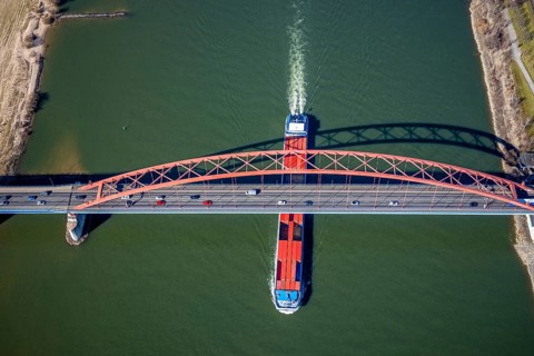 Aerial view, Bridge of Solidarity and container ship on the Rhine, Hochfeld, Duisburg, Ruhr area,