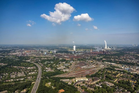 Aerial view, goods train station, thyssenkrupp Steel Europe factory premises, river Rhine with