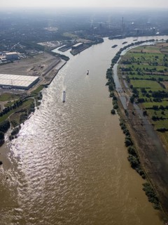 Aerial view, flood river Rhine at logport VI, ferry pier Rhine ferry Walsum, south harbour Walsum,
