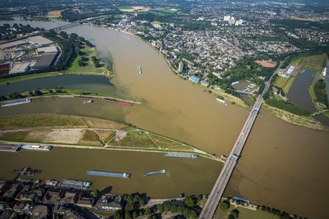 Aerial view, flood river Rhine, Ruhr estuary into the Rhine, Friedrich-Ebert-Bridge, Rhine orange