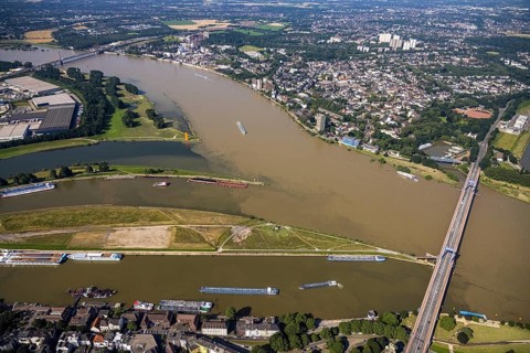 Aerial view, flood river Rhine, Ruhr estuary into the Rhine, Friedrich-Ebert-Bridge, Rhine orange