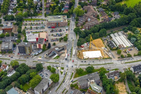 Aerial view, construction site and new building at the intersection of Sittardsberger Allee and