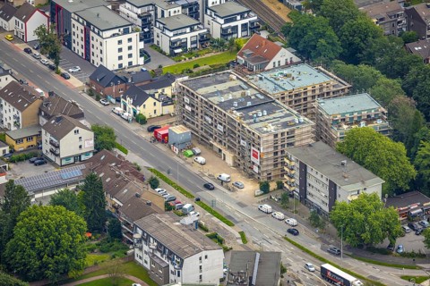 Aerial view, construction site and new senior housing complex for age-appropriate living,