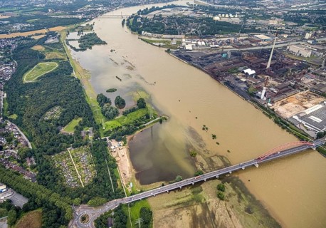Aerial view, flood river Rhine, flooding of the Rhine meadows Rheinhausen, bridge of solidarity,