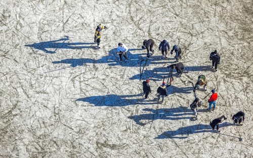 Aerial view, frozen Rhine meadow Ehingen, ice hockey players, Mündelheim, Duisburg, Ruhr area,