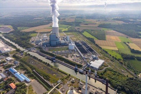 Aerial view of the power plant facilities and exhaust gas towers of the coal-fired power plant