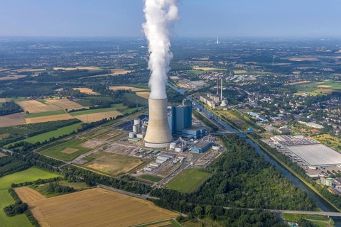 Aerial view of the power plant facilities and exhaust gas towers of the coal-fired power plant