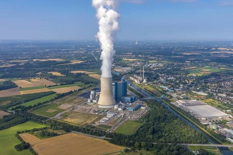 Aerial view of the power plant facilities and exhaust gas towers of the coal-fired power plant