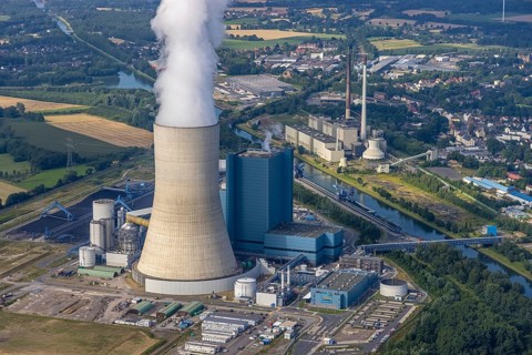 Aerial view of the power plant facilities and exhaust gas towers of the coal-fired power plant