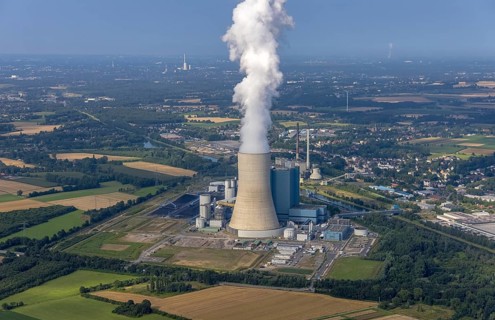 Aerial view of the power plant facilities and exhaust gas towers of the coal-fired power plant
