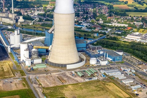 Aerial view of the power plant facilities and exhaust gas towers of the coal-fired power plant