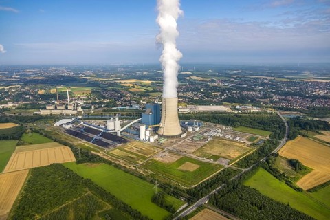 Aerial view of the power plant facilities and exhaust gas towers of the coal-fired power plant