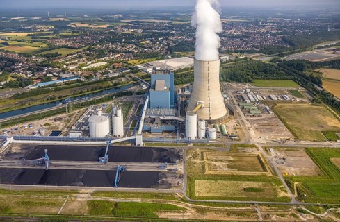 Aerial view of the power plant facilities and exhaust gas towers of the coal-fired power plant