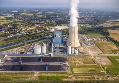 Aerial view of the power plant facilities and exhaust gas towers of the coal-fired power plant