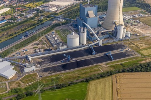 Aerial view of the power plant facilities and exhaust gas towers of the coal-fired power plant