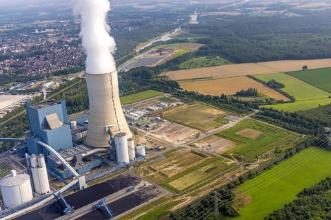 Aerial view of the power plant facilities and exhaust gas towers of the coal-fired power plant