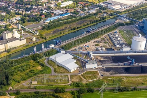 Aerial view of the power plant facilities and exhaust gas towers of the coal-fired power plant