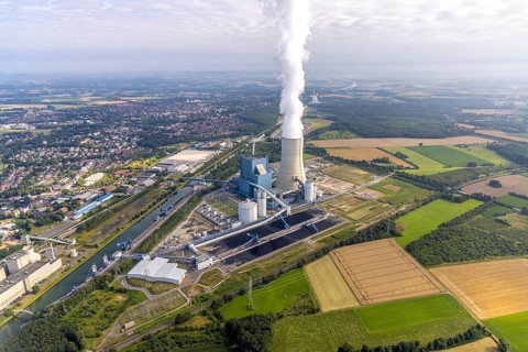 Aerial view of the power plant facilities and exhaust gas towers of the coal-fired power plant