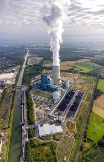 Aerial view of the power plant facilities and exhaust gas towers of the coal-fired power plant