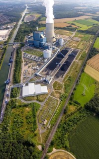 Aerial view of the power plant facilities and exhaust gas towers of the coal-fired power plant