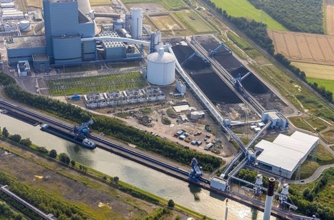 Aerial view of the power plant facilities and exhaust gas towers of the coal-fired power plant