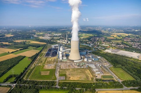 Aerial view of the power plant facilities and exhaust gas towers of the coal-fired power plant