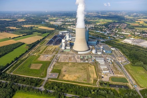 Aerial view of the power plant facilities and exhaust gas towers of the coal-fired power plant