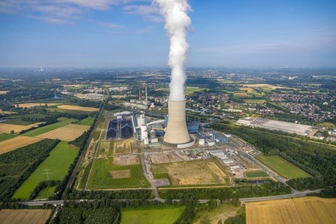 Aerial view of the power plant facilities and exhaust gas towers of the coal-fired power plant