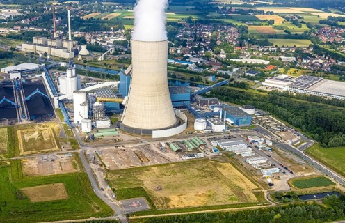 Aerial view of the power plant facilities and exhaust gas towers of the coal-fired power plant