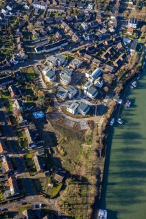 Aerial view of a construction site and new construction of residential buildings with barrier-free