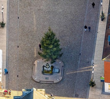 Aerial view of the Stirnberg fountain on the market square with Christmas tree in Dorsten in the