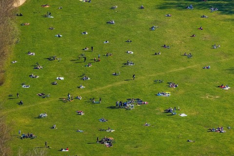 Aerial view, the Tremoniapark a large playground and sunbathing lawn, spring weather on Dortmund's