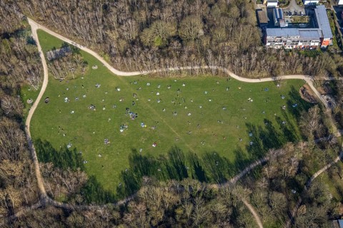 Aerial view, the Tremoniapark a large playground and sunbathing lawn, spring weather on Dortmund's