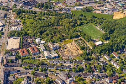 Aerial view, construction site and new building at Winterkampstraße, sports ground TUS
