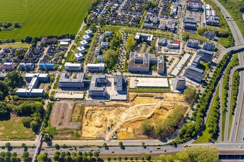 Aerial view, construction site and new building Continentale Directorate, intersection federal road