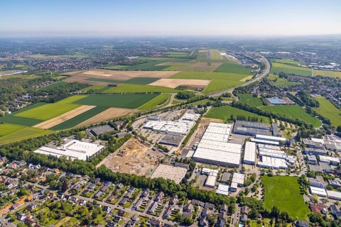 Aerial view, Schleefstraße industrial estate with construction site and new Bauhaus DIY store,