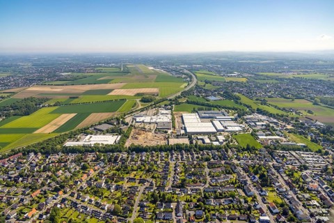 Aerial view, Schleefstraße industrial estate with construction site and new Bauhaus DIY store,