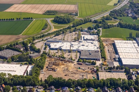 Aerial view, Schleefstraße industrial estate with construction site and new Bauhaus DIY store,