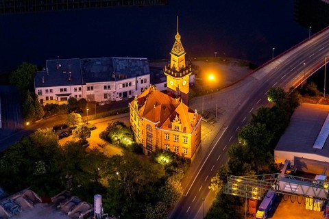 Aerial view, night view of Dortmund harbour, historic building old harbour office, coal port of the