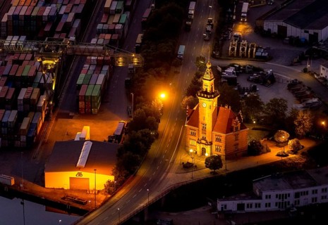 Aerial view, night view of Dortmund harbour, historic building old harbour office, coal port of the