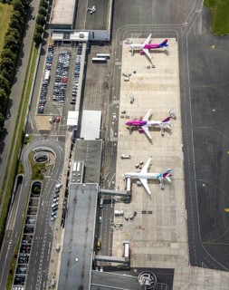 Aerial photo, Dortmund Airport, EDLW, Wickede, apron with two Wizzair jets and a Eurowings plane,