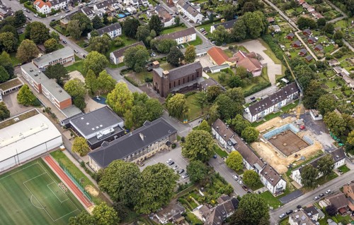 Aerial view, St. Charles Borromeo Catholic Church and Martin Luther King Comprehensive School in