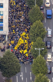 Aerial photo, BVB fans on their way to the BVB 09 football match in the City district of Dortmund,